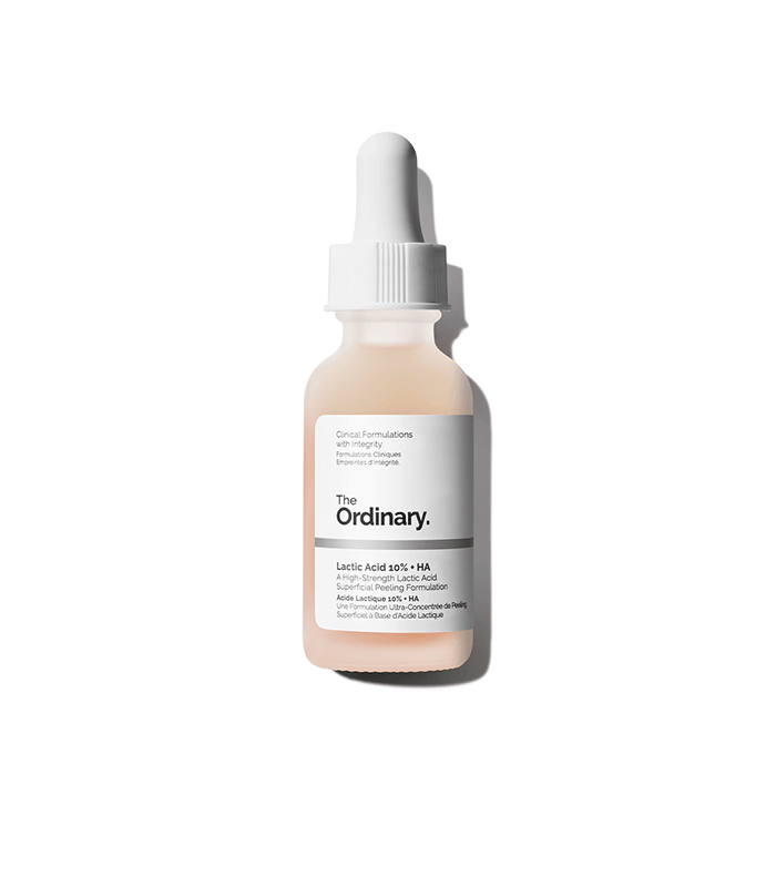 A bottle of The Ordinary Lactic Acid surrounded by other The Ordinary skincare products
